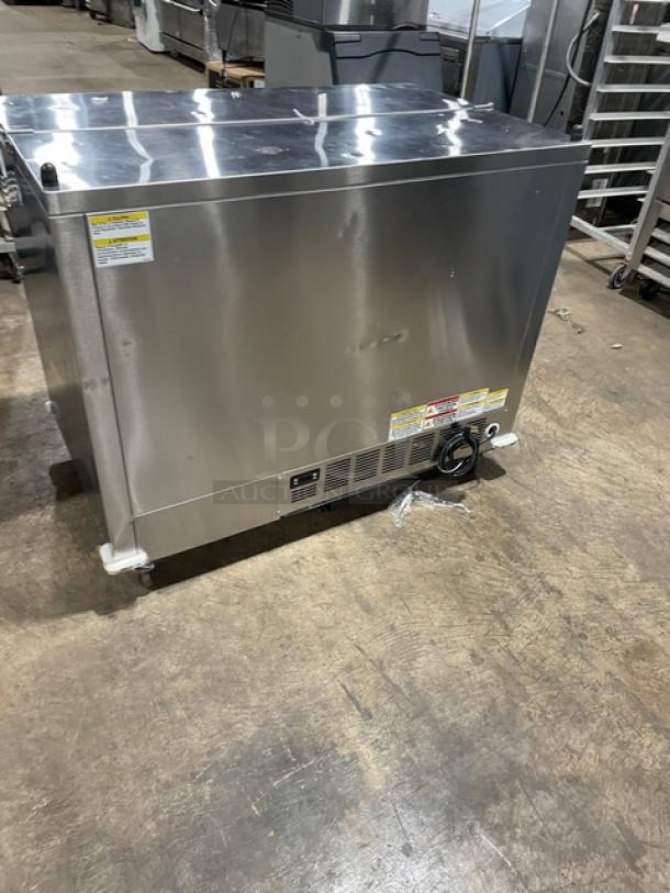 Beverage-Air stainless steel milk cooler, model SM49HC-S-105. Energy Star certified, poly coated wired rack, on casters.