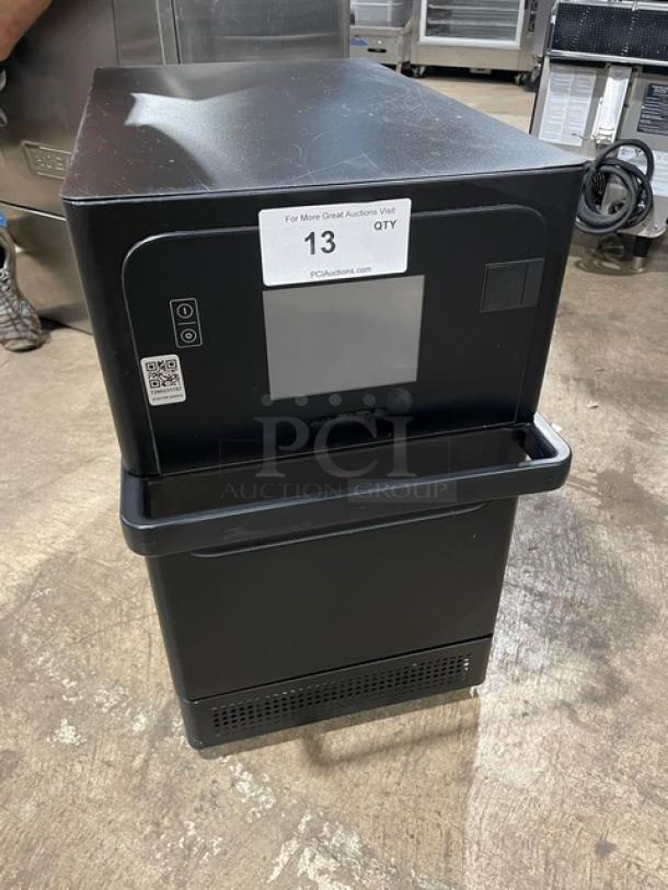 MerryChef Eikon E2S rapid cook oven, black, electric, countertop model, 208/240V, with visible auction tag, excellent condition.
