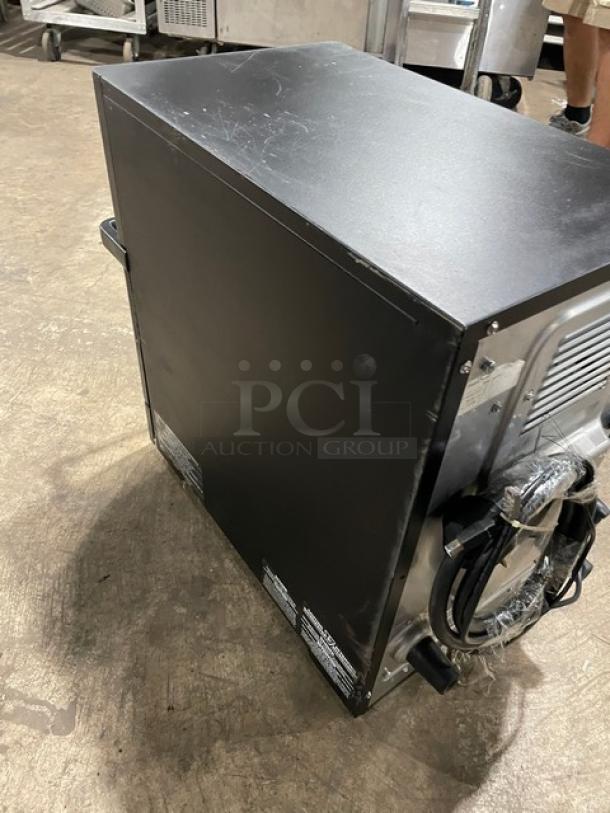 MerryChef Eikon E2S commercial black electric countertop rapid cook oven, 208/240V, good condition, model label visible.