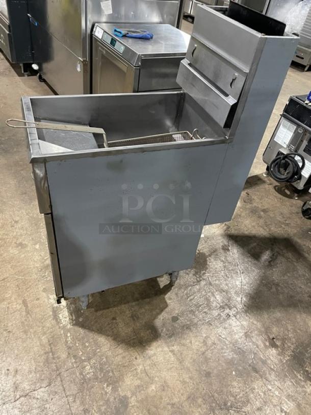 Pitco Frialator 40D natural gas stainless steel fryer, 40 lb. capacity, with backsplash, basket hanger, and fry basket, on legs.