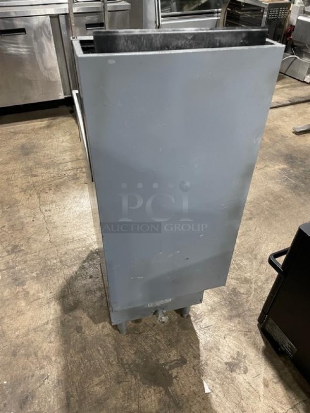 Pitco 40D commercial stainless steel natural gas fryer, 40 lb capacity, with backsplash, basket hanger, and fry basket, on legs.