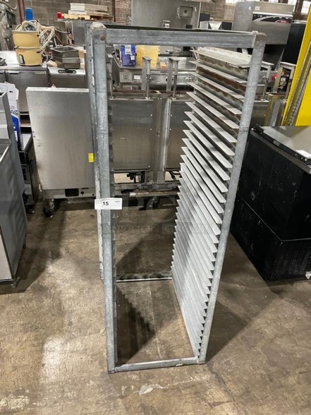 Commercial heavy duty pan holding rack, metal construction, multiple shelves, shows light wear, ideal for kitchen use.