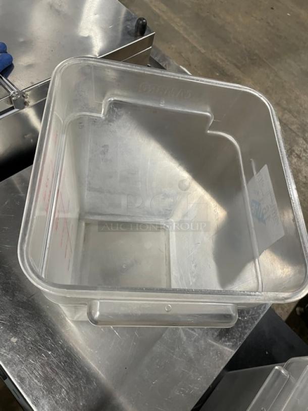 Cambro clear 22 Qt. food storage container, commercial-grade, in good condition. Marked with measurement indicators.