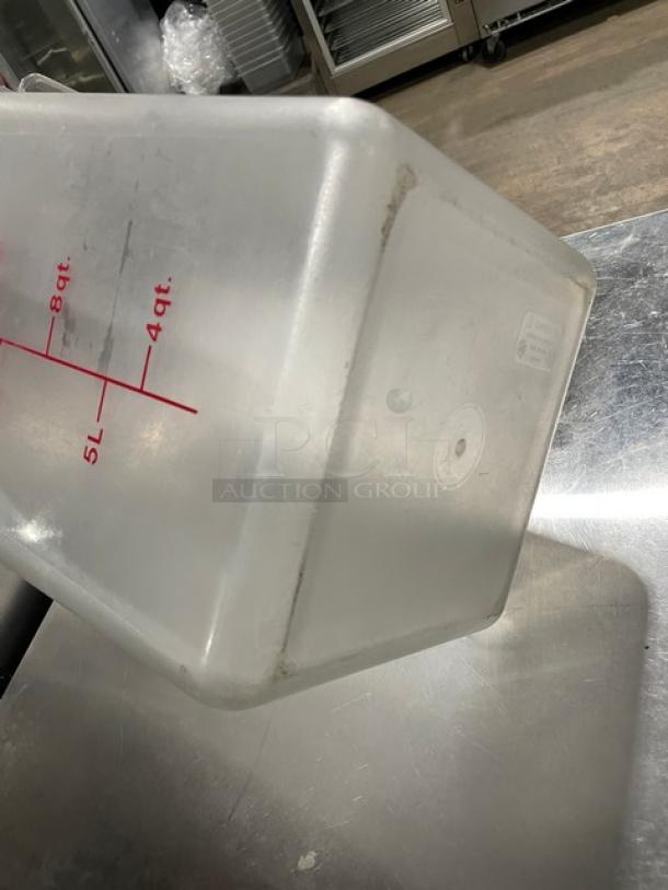 Cambro commercial clear 22 Qt. food storage container with measurement markings, slightly used condition, durable plastic.