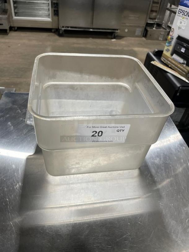 Cambro clear square food storage container, commercial-grade, moderate wear. Visible label indicates quantity.