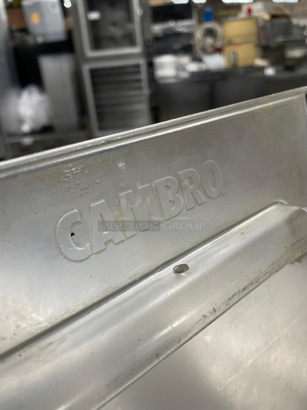Cambro commercial clear square food storage container in used condition. Features Cambro branding embossed on the side.