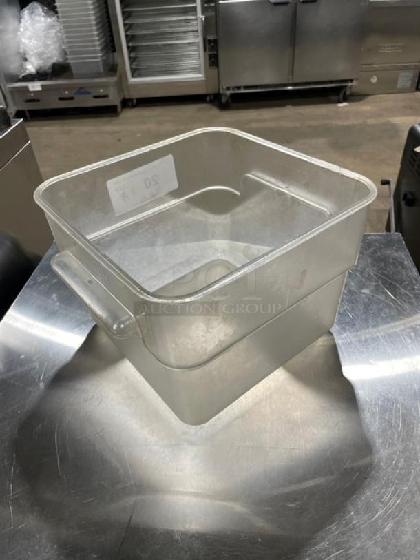 Cambro commercial clear square food storage container, durable plastic, used condition, visible capacity markings.