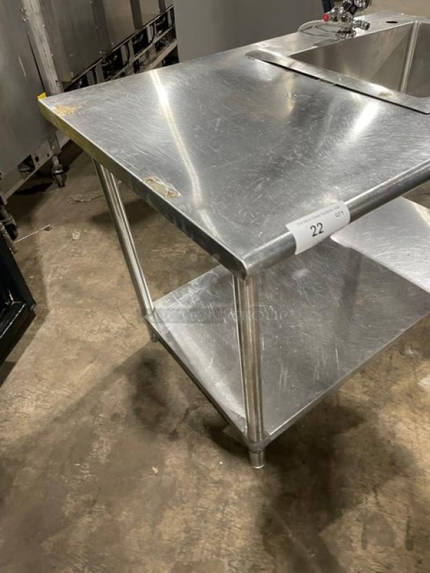 Commercial stainless steel hand washing/prep sink with gooseneck swivel faucet, single undershelf, on sturdy legs.