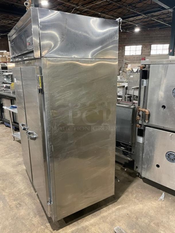 Victory stainless steel solid 2-door reach-in refrigerator, model RS2DS7, with pan slides, on legs. Model SN: J0978460.