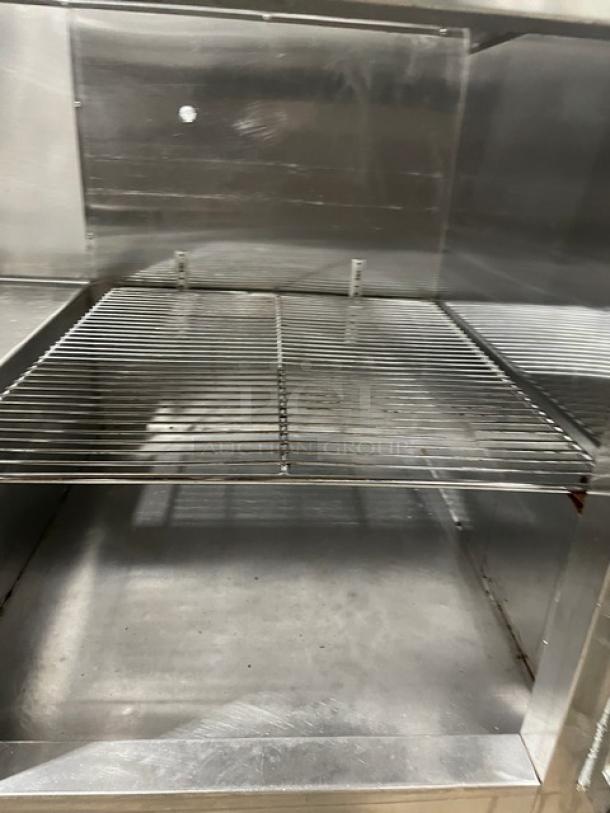 CoolTech 2018 stainless steel prep table, model CMPH48BMO, with a chrome-plated wire rack, refrigerated interior.