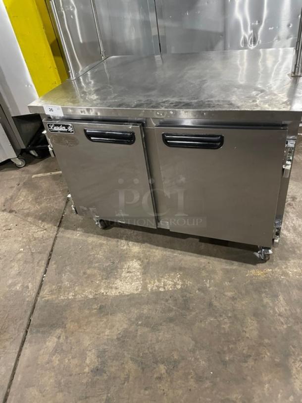 Leader Commercial Stainless Steel 2-Door Lowboy Refrigerator, Model ESLB48SC, with overhead shelf and receipt holder, on casters.