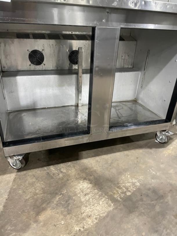 Leader ESLB48SC 2-door stainless steel lowboy worktop refrigerator with double overhead shelf, on casters. 115V 1 Phase.