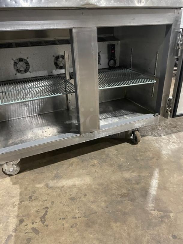 Leader 2-door undercounter worktop refrigerator, model NSFB48SC, stainless steel, poly-coated rack, 115V, on casters.