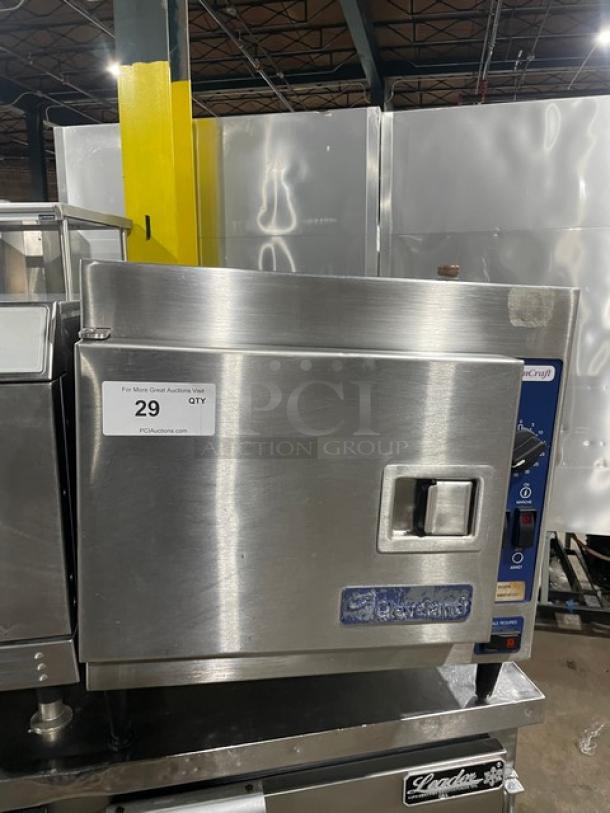Cleveland Range 21CET8 stainless steel convection steamer, 3-pan capacity, electric, countertop model, built-in pan rack, on legs.
