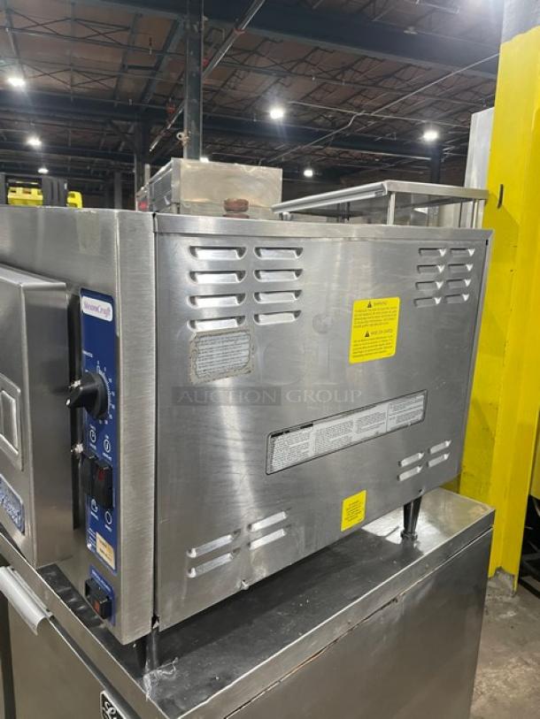 Cleveland Range 21CET8 stainless steel electric countertop convection steamer, 3-pan, built-in rack, 208V, 3-phase.