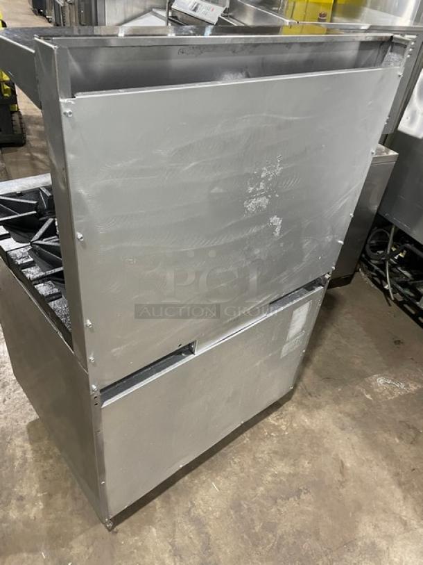 Southbend Model 4367D commercial stainless steel range with 4 burners, oven, backsplash, salamander shelf. Serial SN: 22F74625.