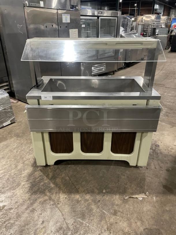 Custom stainless steel refrigerated salad bar with sneeze guard, folding tray slide, and casters, excellent condition.