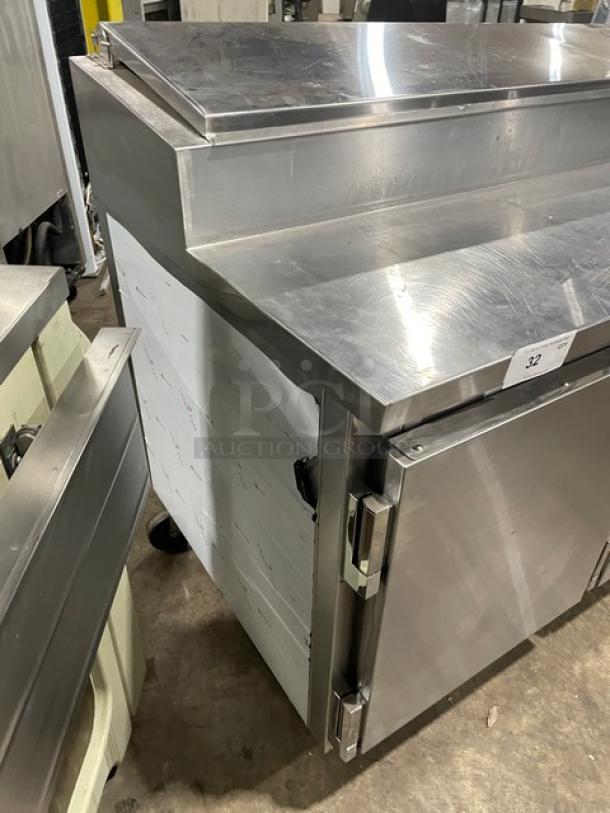 Marsal BM72R 3-door stainless steel refrigerated pizza prep table with pan slides, shelving, model BM72R, serial 1961, on casters.