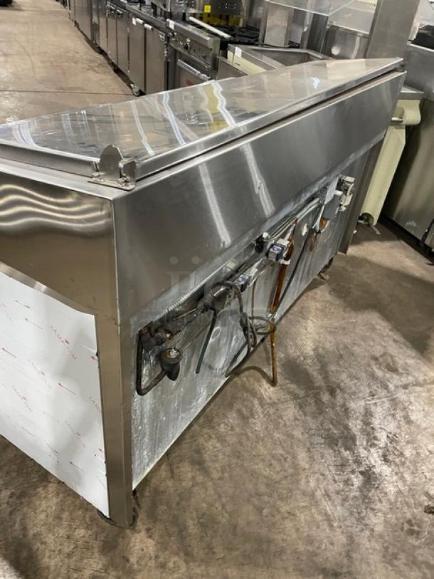 Marsal BM72R 3-door stainless steel refrigerated 72" pizza prep table, built-in pan slides and shelving, on casters, no compressor.