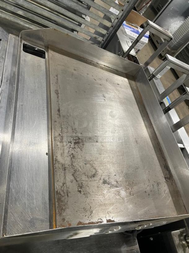 Cecilware EL1624 stainless steel 24" countertop flat griddle, electric powered, with thermostatic control, back and side splash, on legs, 240V. Visible wear on cooking surface.
