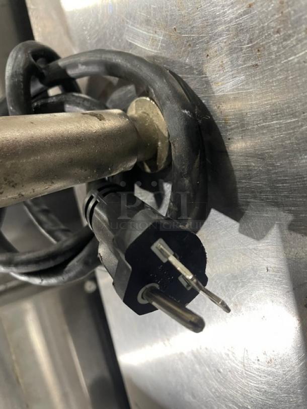 Cecilware EL1624 stainless steel electric griddle plug, showing power cord and metal finish detail.