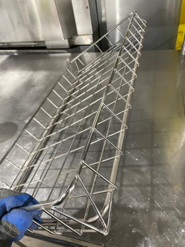 Commercial full-sized chrome-plated wire rack for bagels/pastries, showing sturdy construction and excellent condition.
