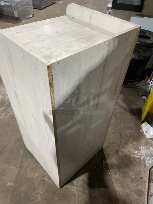 Commercial wooden enclosed-style waste receptacle cabinet with a shabby chic finish. Used condition with visible wear.