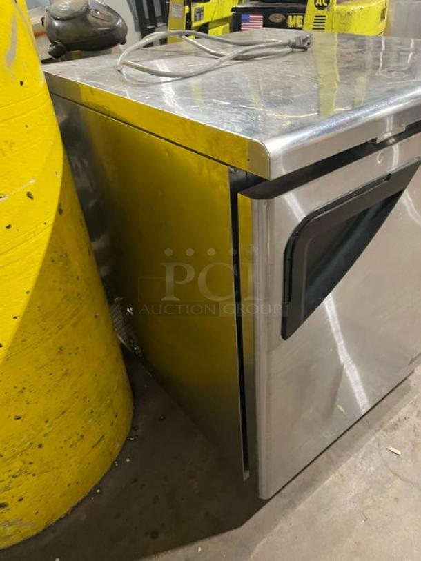 True TUF-28SD stainless steel single door undercounter worktop freezer, commercial grade, on casters, with poly coated rack.