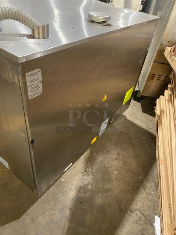 Rational SCCWE62G stainless steel combi oven, natural gas, 6-pan capacity, Energy Star certified, with gas hose, on legs.