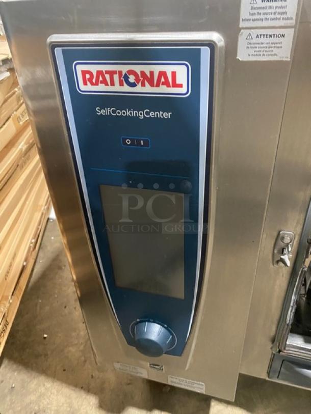 Rational SelfCookingCenter SCCWE62G commercial combi oven, stainless steel, with control panel, Energy Star certified, on legs.