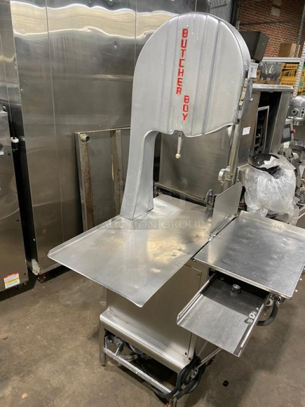 Butcher Boy commercial stainless steel electric meat band saw, free-standing, in good condition with visible red branding.