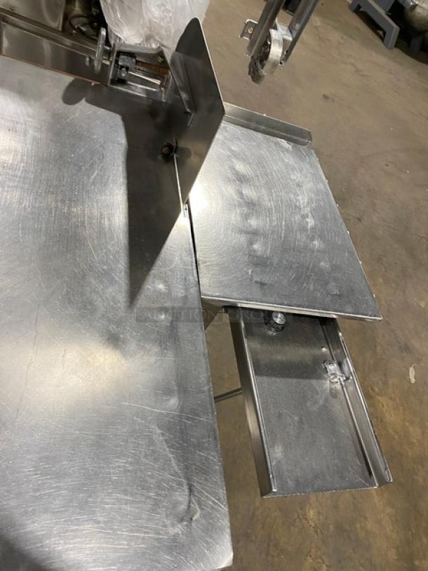 Butcher Boy commercial stainless steel meat band saw, free-standing, electric-powered, heavy-duty, with legs, in good condition.