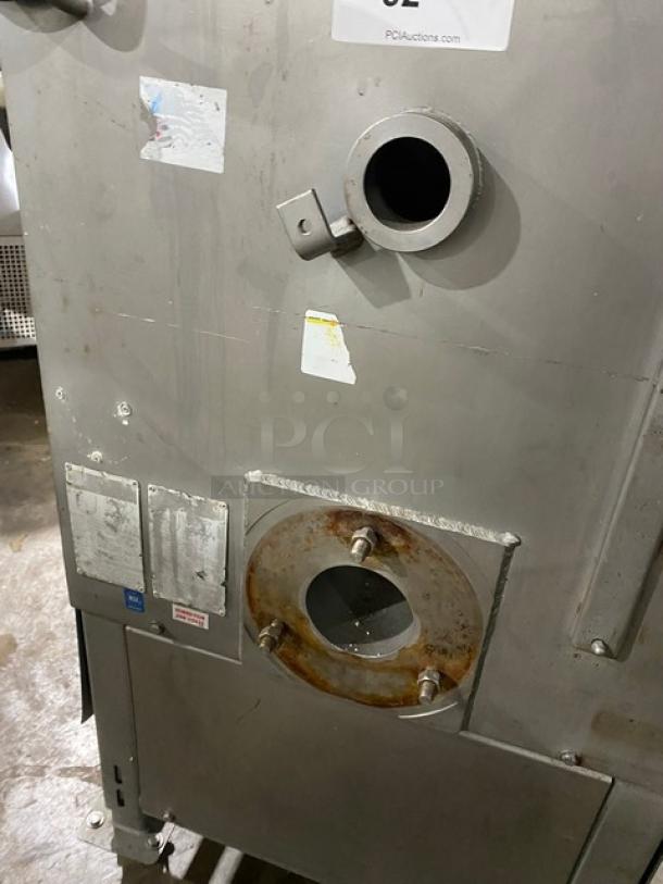 Biro commercial electric-powered heavy-duty meat mixer/grinder, free-standing on casters. Metal body with visible wear.
