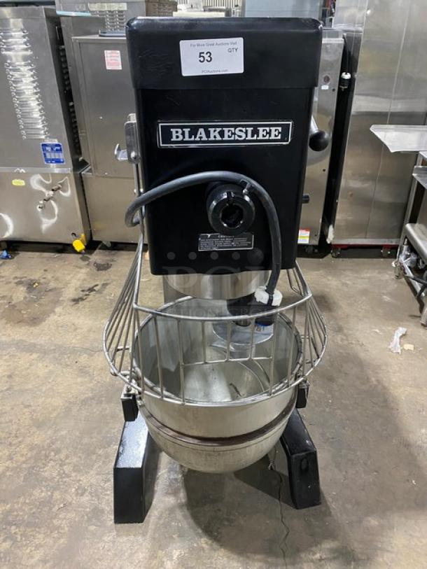 Blakeslee commercial black electric planetary mixer with stainless steel bowl guard, mixing bowl, and spiral hook attachment.