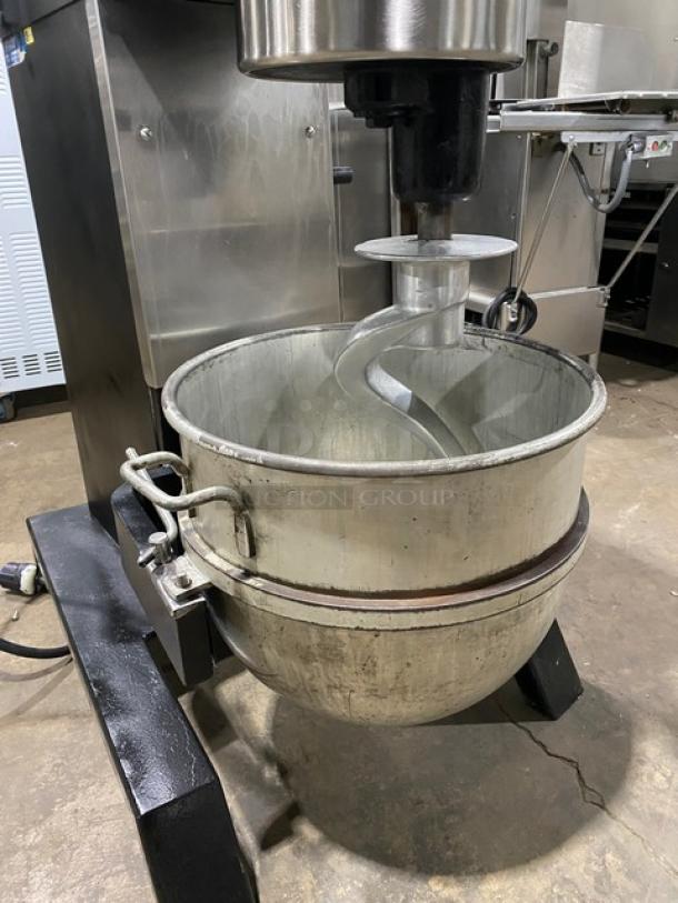Blakeslee commercial black electric planetary mixer with stainless steel bowl guard, mixing bowl, and spiral hook attachment.