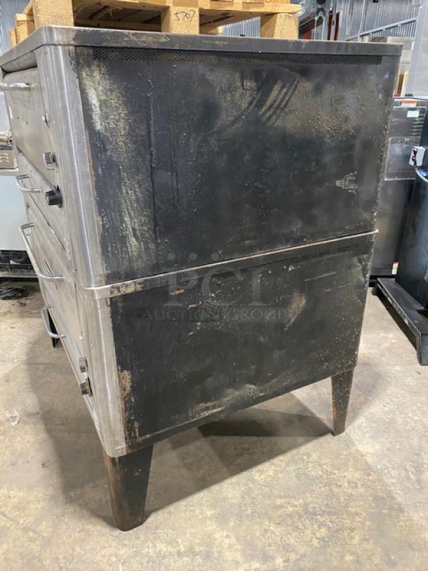 Blodgett commercial double stacked pizza deck oven, natural gas, stainless steel, with stones, on legs, working condition.