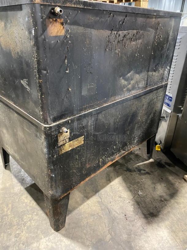 Blodgett stainless steel natural gas double pizza deck oven, with stones, on legs. Used condition, signs of wear.