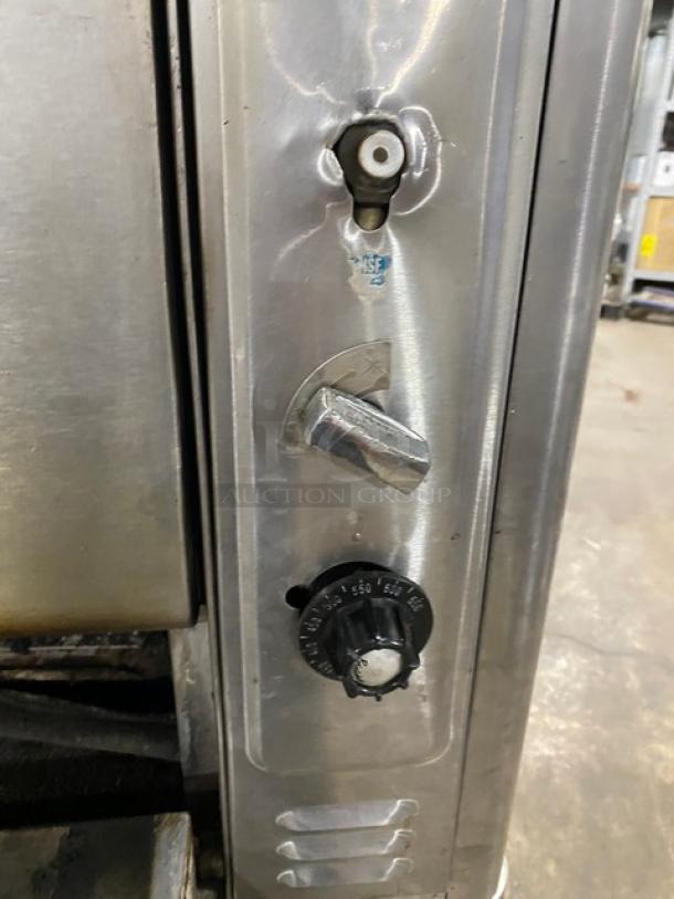 Blodgett commercial stainless steel pizza deck oven control panel, featuring temperature dial and ignition knob. Natural gas powered.