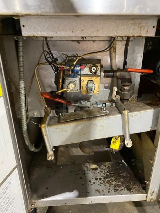 Frymaster Filter Magic II commercial fryer, model FM245EBLMSC, stainless steel, natural gas, with center dump station and grease filter.