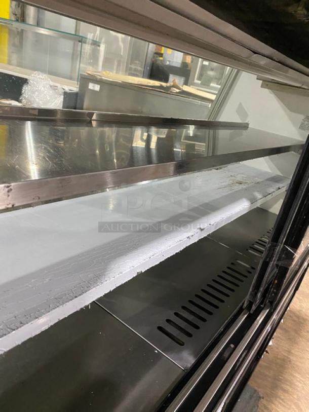 Leader Model ERHD72ES commercial stainless steel refrigerated deli merchandiser with slanted glass, adjustable shelves, lower storage.