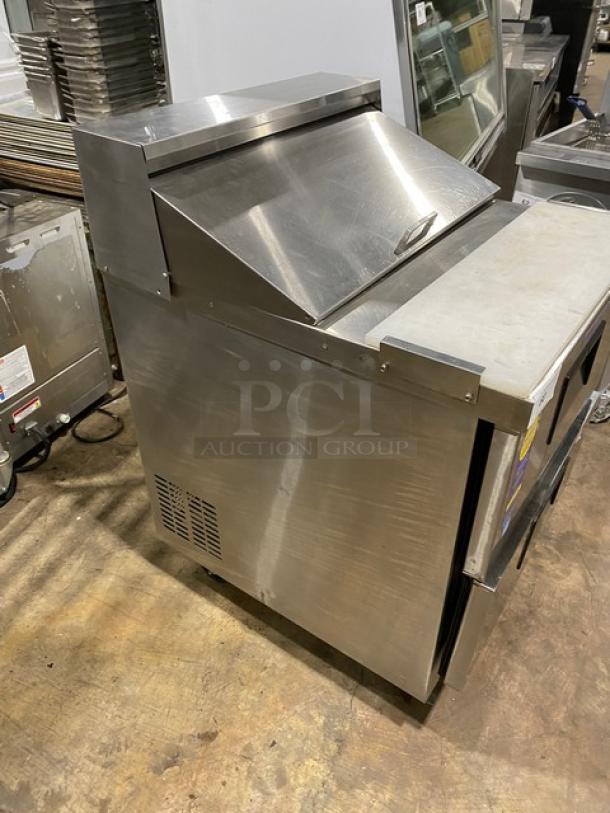 Everest EPBNR1 stainless steel 2-drawer prep table with cutting board, refrigerated, on casters, 115V, commercial use.