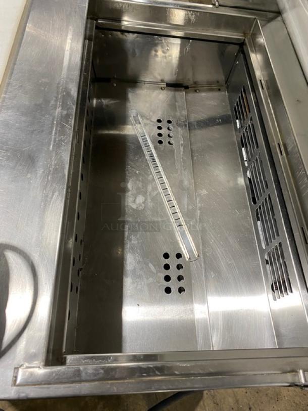 Everest EPBNR1 refrigerated prep table, stainless steel, 2 drawers, bain marie style, with cutting board, on casters.