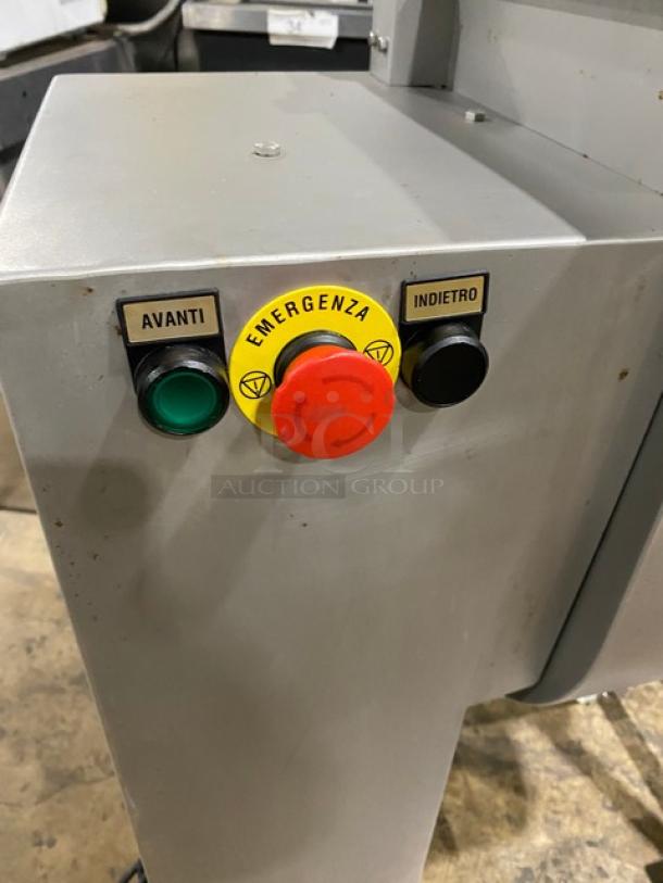 Tre Spade/Omcan MX-50 meat mixing machine controls, featuring emergency stop and directional buttons.