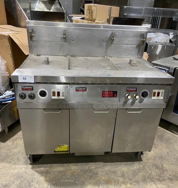 Frymaster Filter Magic II Series FM245EBLMSC commercial 2-bay deep fryer, natural gas, stainless steel, with center dump and grease filter, on casters.