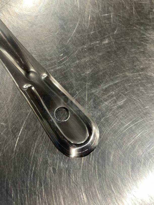 Brand new Update International 18" perforated basting spoon, stainless steel, Model BSPF18HD, perfect condition.