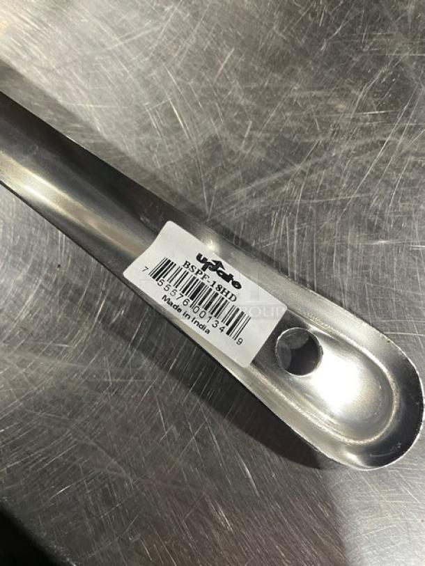 Brand new Update International 18" perforated basting spoon, model BSPF18HD, stainless steel, with product label shown.
