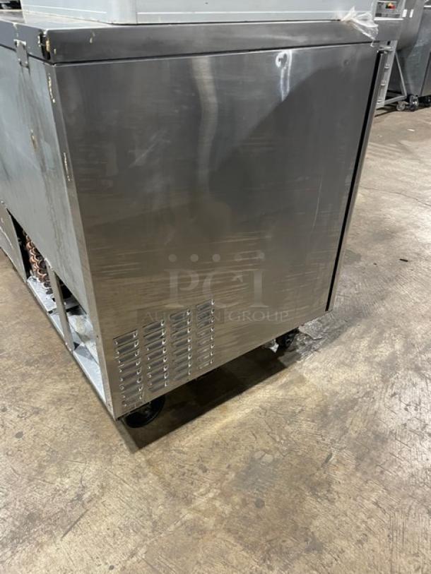 Turbo Air M3 Series 3-door undercounter refrigerator, stainless steel, model MUR-72, with casters and poly-coated rack.