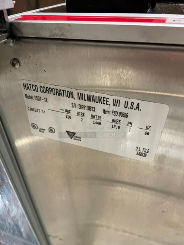 Hatco Flav-R-Savor commercial food merchandiser, model FSDT-1X, with 4-pan rack, shown with label detailing specs and serial number 5099130813.