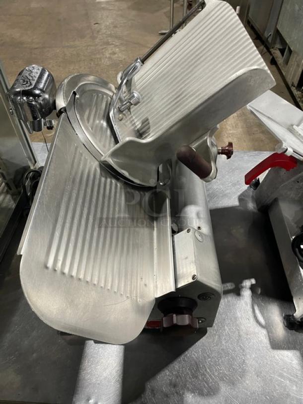 Globe Commercial Electric Meat Deli Slicer, Model 400, heavy-duty, countertop, on legs, excellent condition.