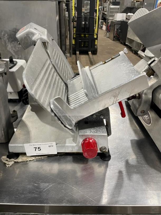 Fleetwood commercial electric deli slicer, countertop model, heavy duty, on legs, visible wear, red adjustment knob.